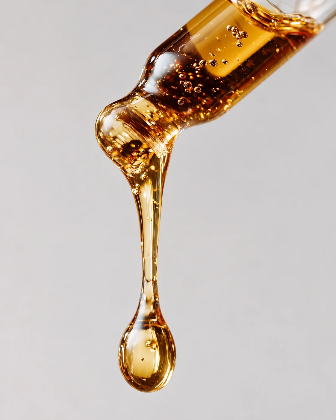 A creamy golden drop of nourishing oil